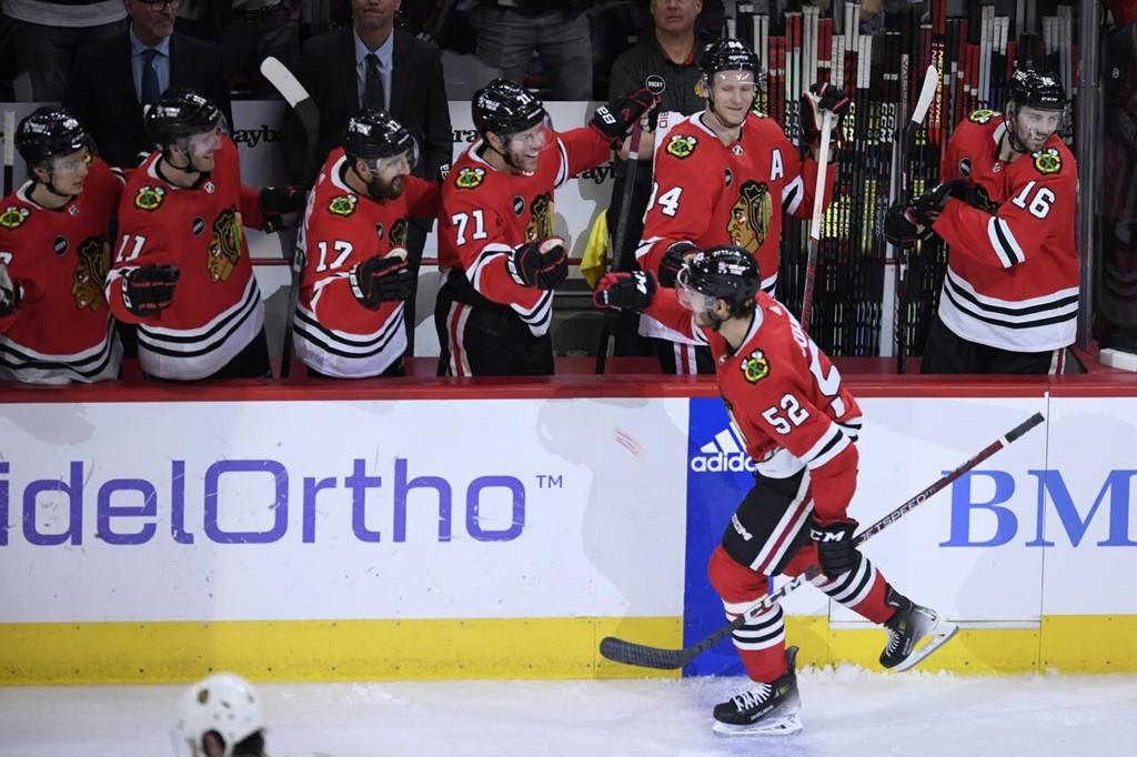 Bedard scores for Chicago, but Roy and Stone lead undefeated Golden Knights  past the Blackhawks, World