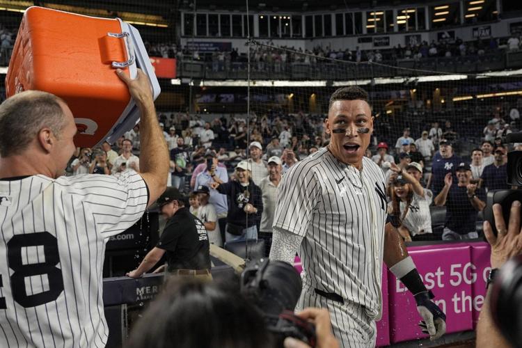 Yankees rally past Mariners 6-5 in 10 innings after going hitless against Bryan Woo until the 8th