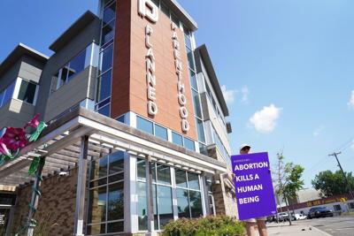 A Planned Parenthood affiliate plans to close 4 clinics in Iowa and another 4 in Minnesota