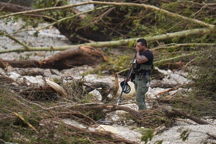 Search for 27 missing girls plows forward after flash flood kills at least 51 people in Texas