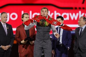 Blackhawks recall D Artyom Levshunov from the minors and place D Louis Crevier on IR