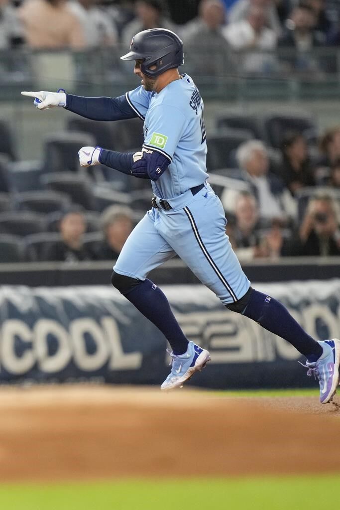 BRONX, NY - SEPTEMBER 19: George Springer #4 of the Toronto Blue Jays  rounds the bases after he hits a home run during the Major League Baseball  game against the New York