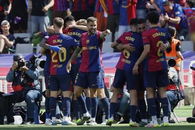 Barcelona rallies to beat Real Madrid 4-3 despite Mbappé hat trick to move closer to La Liga title