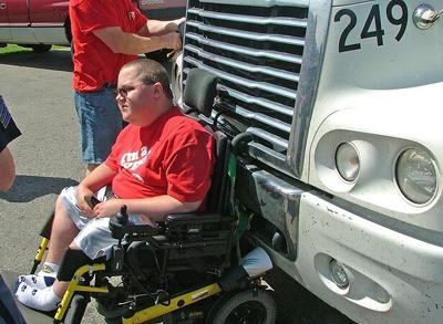 Man, wheelchair on wild ride