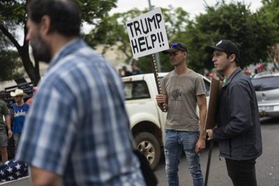 Trump is bringing white South Africans to the US as refugees, but what persecution are they facing?