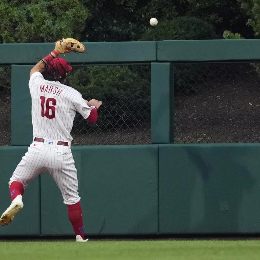 Nola, Schwarber help the Phillies beat the Brewers 4-3 for their 4th  straight victory