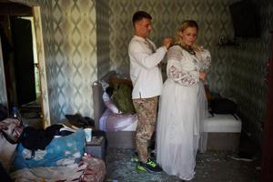 A Russian strike tore apart a couple's home on the eve of their wedding. They still got married
