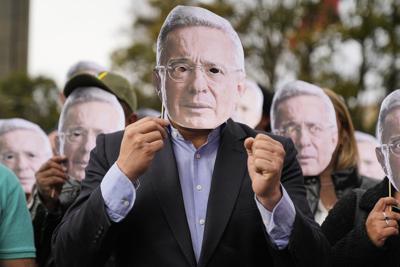 Colombian ex-President Álvaro Uribe is sentenced to 12 years house arrest for bribery