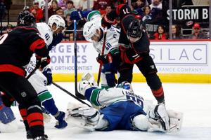 Aho scores in OT to lift Hurricanes to 4-3 win over Canucks