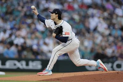 Woo strikes out 13 as Mariners beat Angels 5-3