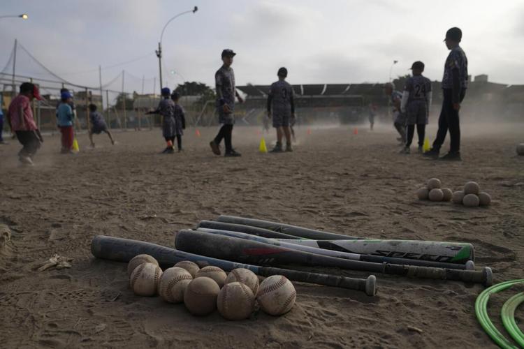 baseball-becomes-a-shelter-for-venezuelan-children-in-soccer-mad-peru