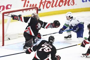 Conor Garland scores 2 including OT winner as Canucks rally to beat Sabres 4-3