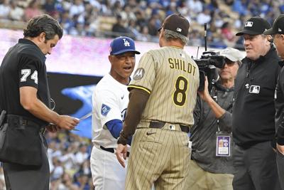 Dodgers snap Padres' win streak, tie for first in NL West