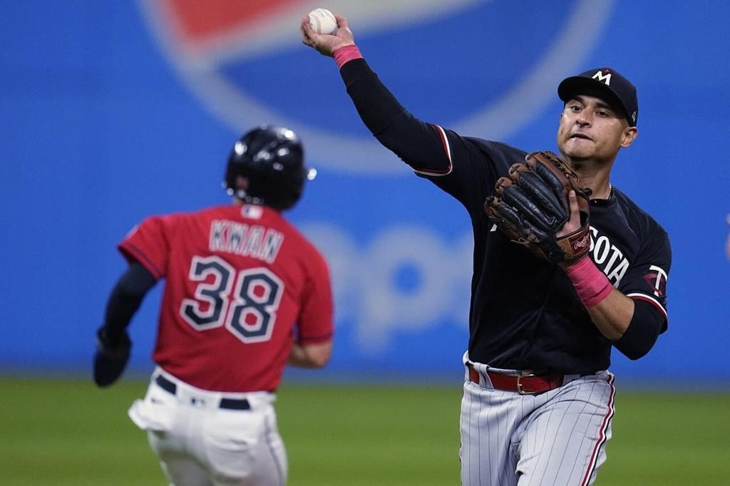 Royce Lewis hits a grand slam, drives in 6 as the AL Central-leading Twins  crush Cleveland 20-6