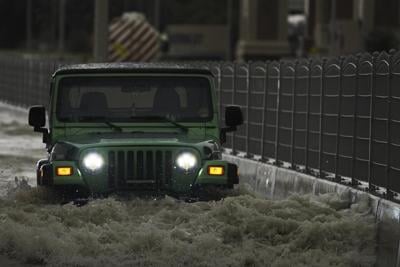 Storm dumps heaviest rain ever recorded in desert nation of UAE, flooding roads and Dubai's airport