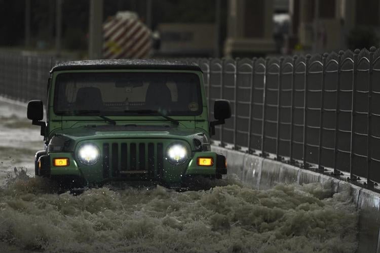 Storm dumps heaviest rain ever recorded in desert nation of UAE, flooding roads and Dubai's airport