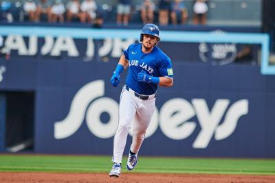 Blue Jays pull away late after squandering big lead to defeat Yankees 11-9