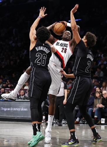 Simons scores 38, Trail Blazers nearly flawless in overtime to beat the Nets 134-127