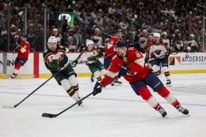 Brad Marchand scores 2, including decisive OT goal, in Panthers 4-3 win over Wild