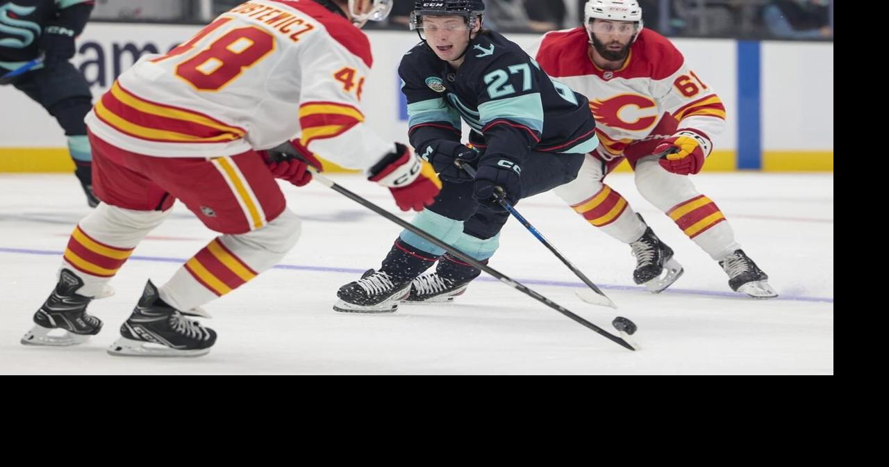 Flames jump out to a hot start, burn Kraken 6-1