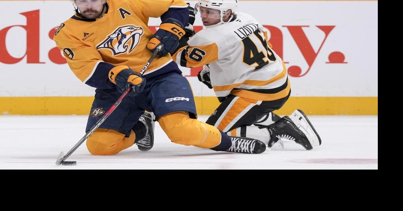 Rust scores twice, including OT winner, to lead Penguins over Predators 5-4