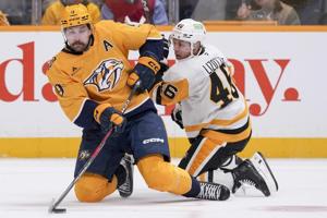Rust scores twice, including OT winner, to lead Penguins over Predators 5-4