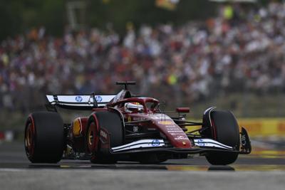 Ferrari's Leclerc beats the McLarens to take pole for F1's Hungarian Grand Prix