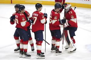 Panthers beat Oilers 4-3, take first place in Atlantic Division