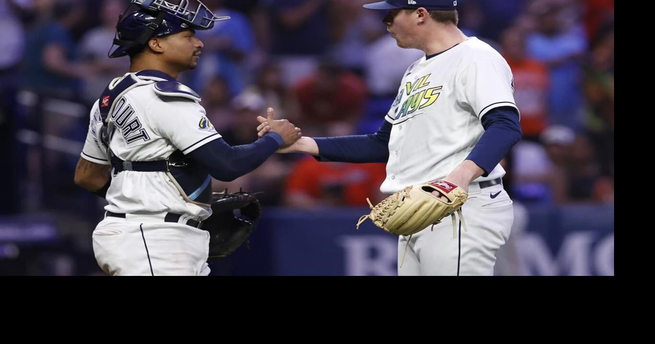 Tampa Bay Rays catcher Christian Bethancourt celebrates with relief pitcher  Pete Fairbanks (29) after they defeated the Texas Rangers during a baseball  game, Sunday, Sept. 18, 2022, in St. Petersburg, Fla. (AP