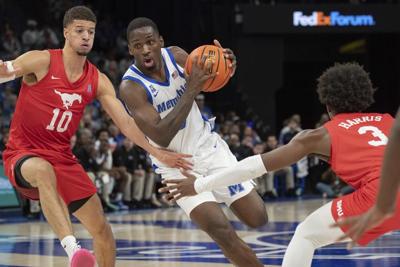 Jahvon Quinerly's 3-pointer with 3 seconds left helps No. 15 Memphis to a 62-59 win over SMU