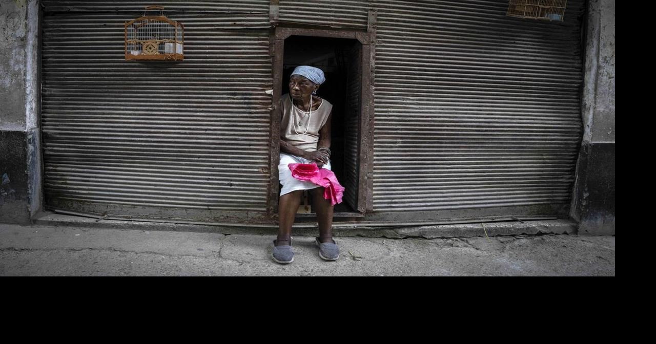A year after protests, Cuba struggles to emerge from crisis