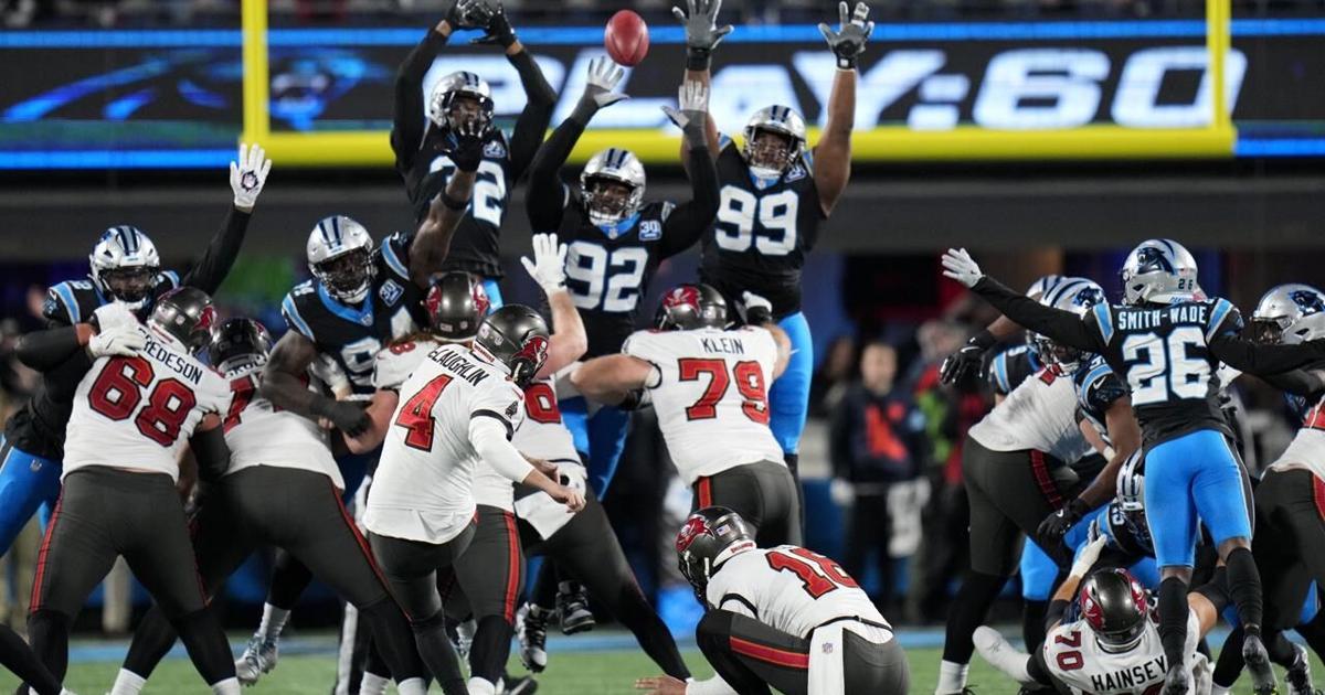 McLaughlin's field goal in OT helps Bucs beat Panthers 26-23, move into 1st-place tie in NFC South
