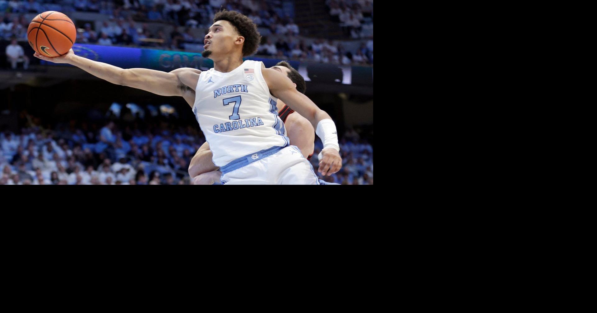 Seth Trimble scores a career-high 30 points as No. 18 UNC holds off No. 24 Louisville 77-74