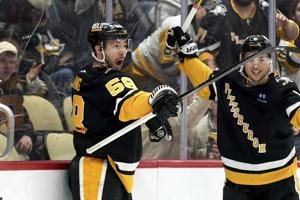 Bunting scores key power-play goal to power Penguins past Maple Leafs 5-2