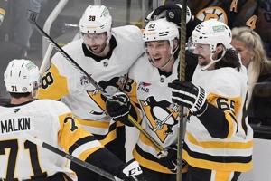 Tomasino scores 3rd period goal to give Penguins 2-1 win over Bruins