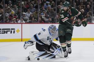 Vejmelka makes 26 saves, Hayton scores twice in Utah's 4-0 victory over the Wild