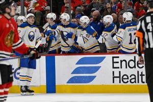 Thompson stars as Sabres clinch Atlantic title with a 5-1 victory over Blackhawks