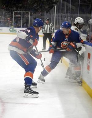 Kyle Palmieri's 1st-period hat trick leads Islanders past Bruins 5-1