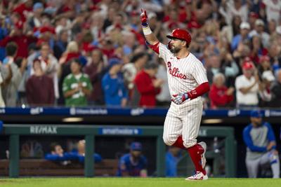 Suárez's 12 strikeouts, Schwarber's 50th homer lead Phillies past Mets