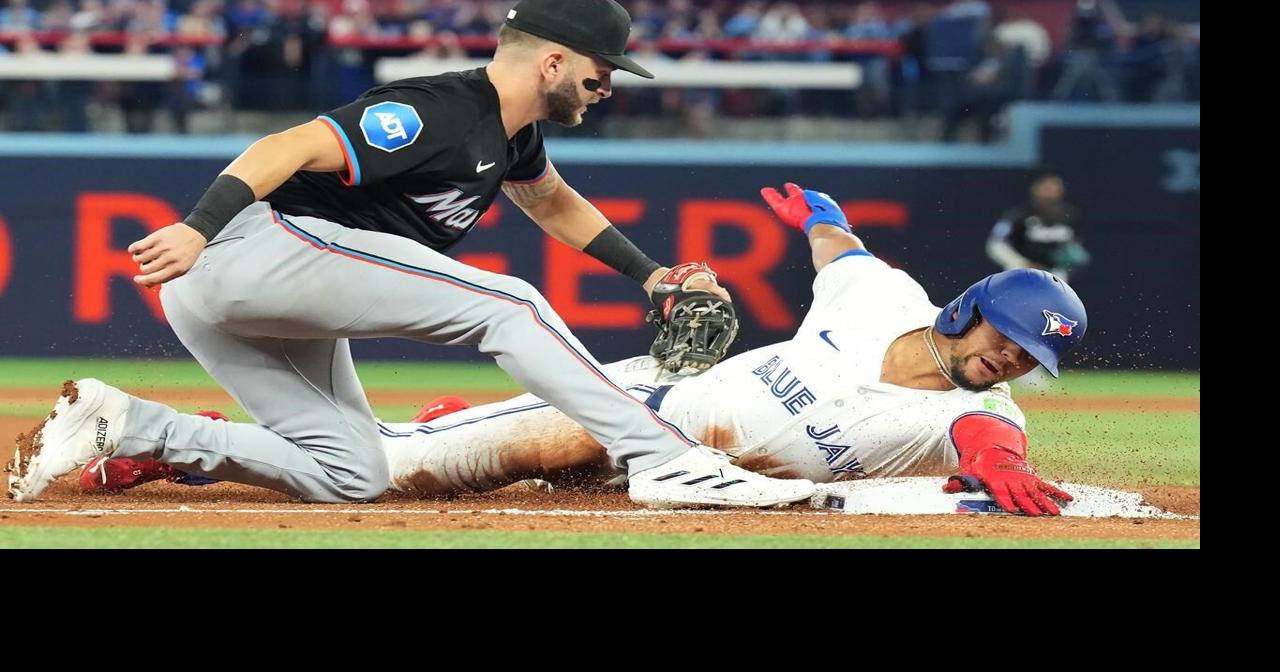 Marlins strike early, crush Blue Jays 15-5