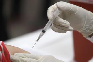 Ontario is launching free flu and COVID-19 shots next week as vaccination rates decline