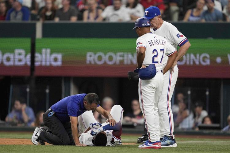 Rangers 2B Marcus Semien takes pitch to helmet, then stays in game to score against Braves