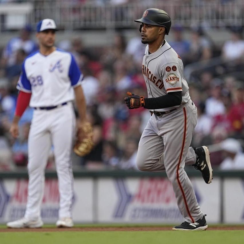 Giants' bats awaken but Eddie Rosario gives Braves four hits in win