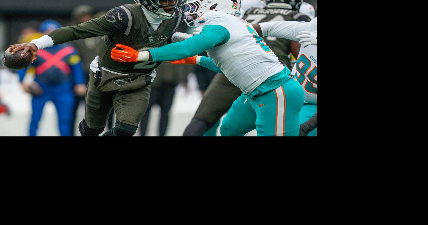 Dolphins’ Achane leaves with a rib injury; Jets rookie QB Cook steps in for injured Taylor