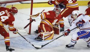 Wolf, Farabee shine as Flames edge Canadiens 1-0