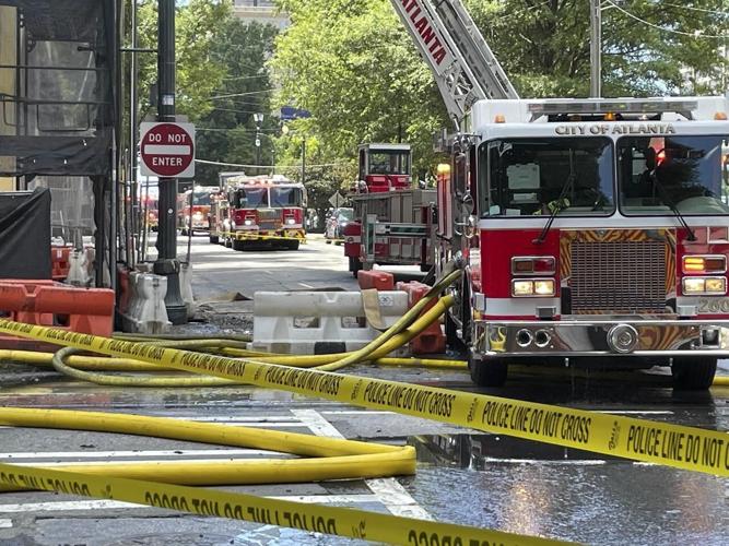 Atlanta skyscraper fire sends smoke billowing from rooftop
