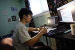 Victor working at desk