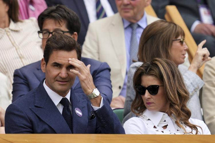 Federer is back in Wimbledon's Royal Box as he watches Djokovic's match