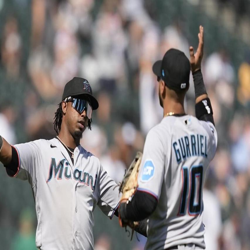 Miami Marlins first baseman Yuli Gurriel (10) swings at the pitch in an MLB  baseball game