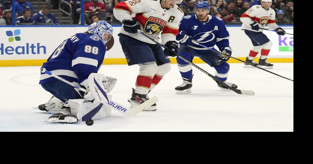 Panthers Tkachuk helped off the ice after collision with Tampa Bay's Kucherov; returns to game